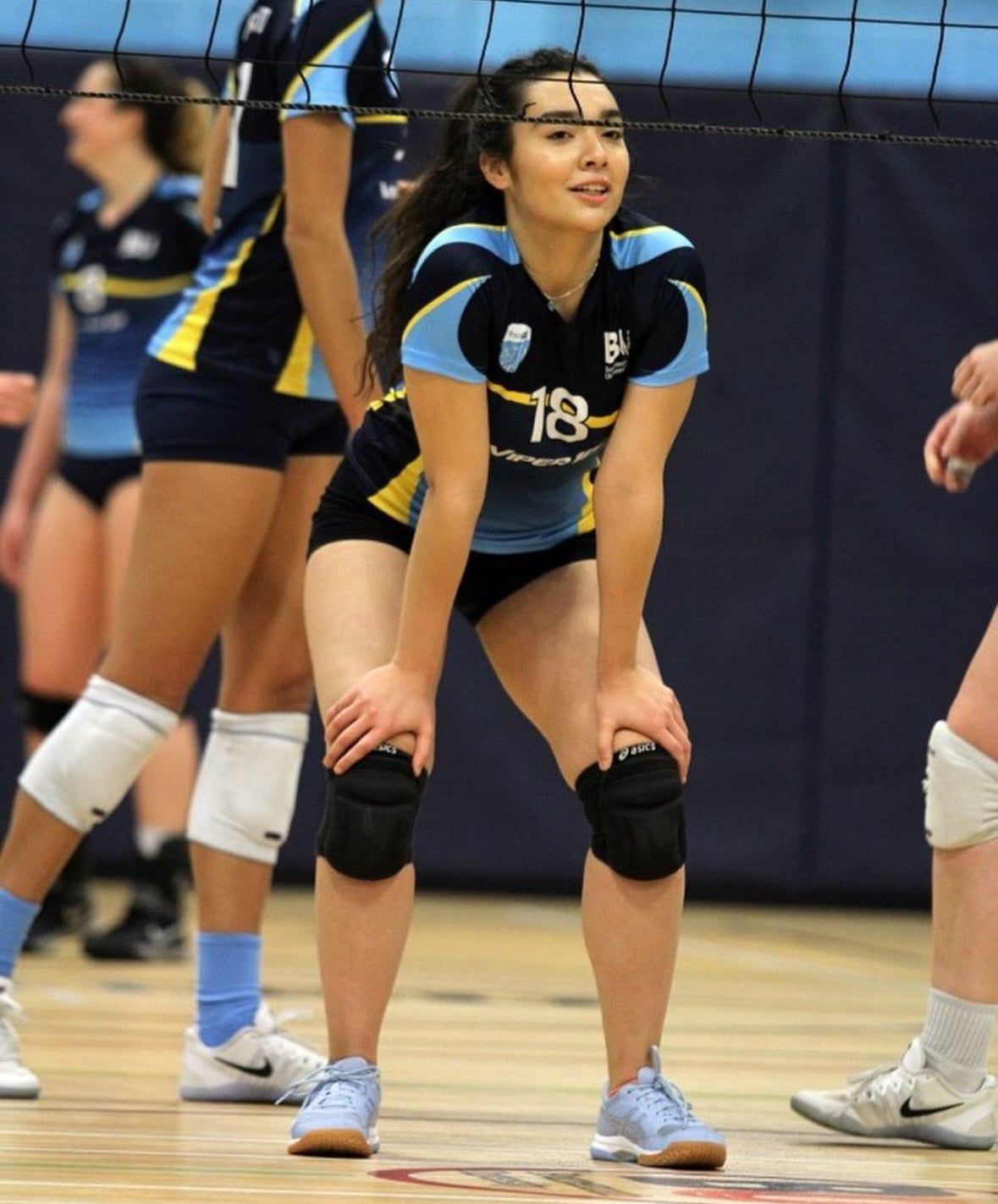 Sophie playing volleyball.