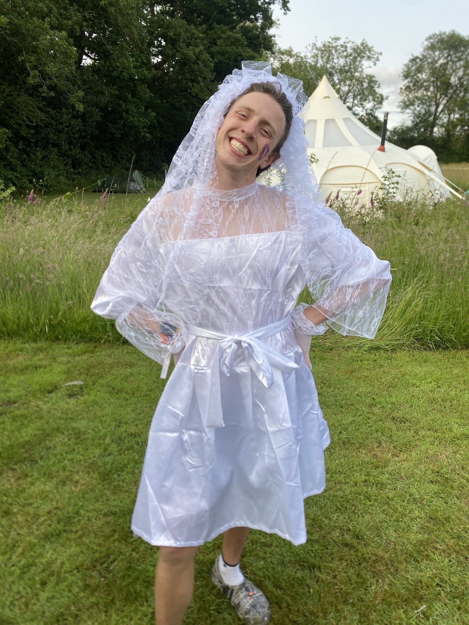 Kurt in a wedding dress.