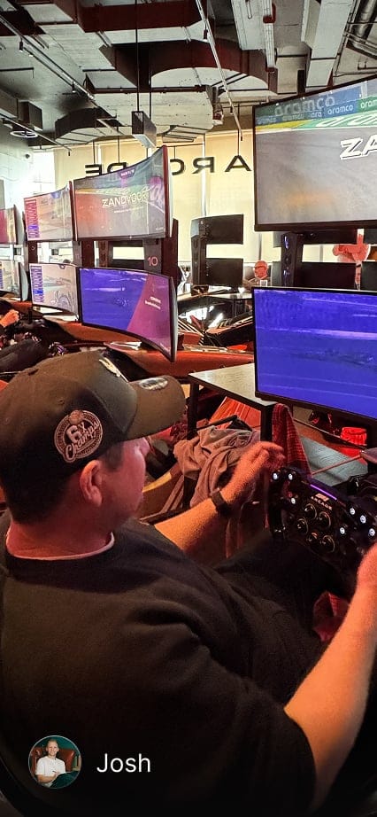 Carl on a racing simulator.