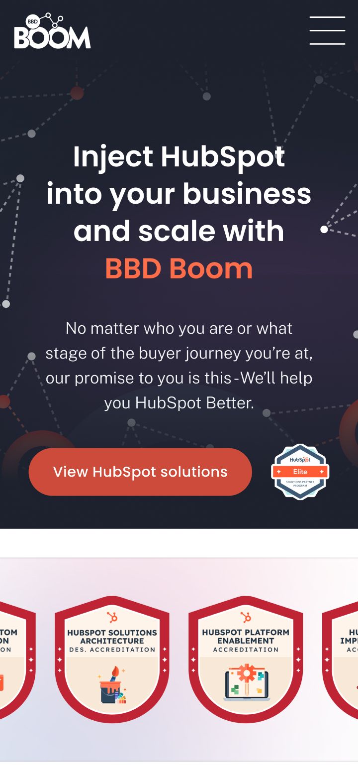 A mobile webpage for BBD Boom HubSpot solutions displays a headline, descriptive text, a call-to-action button, and four badge icons representing different HubSpot service categories.
